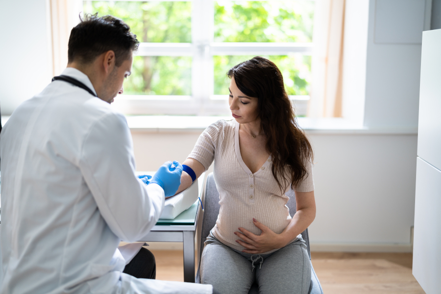 A pregnant woman has her blood drawn