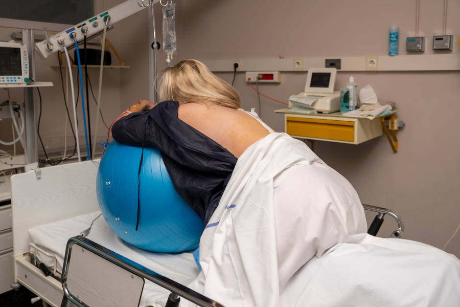 Woman during labor on exercise ball