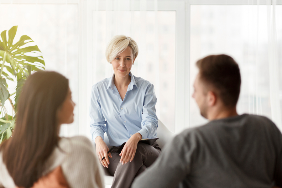 A couple speaking to a therapist