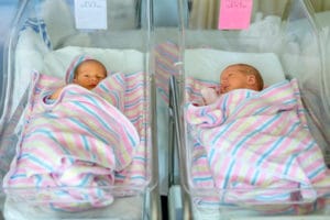 Twins in bed post birth
