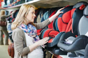 A mother shopping for a car seat