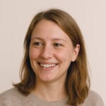 A representative smiling woman image for a testimonial